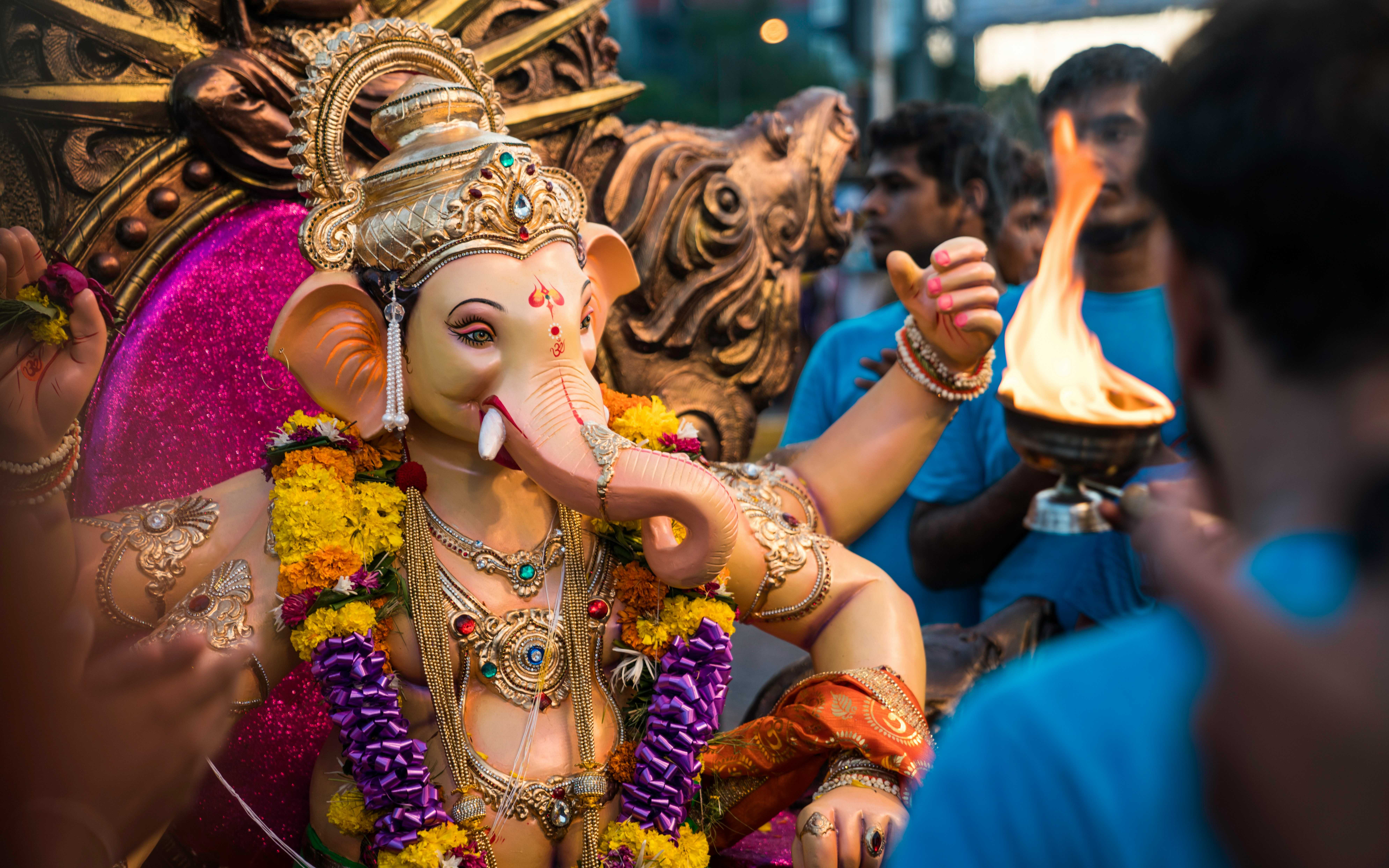 Stunning Ganesha idols, rhythmic chants, and heartfelt prayers fill the streets with festive energy.